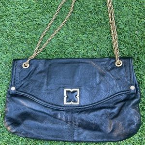 BCBGMaxazria black leather handbag with gold metallic chain